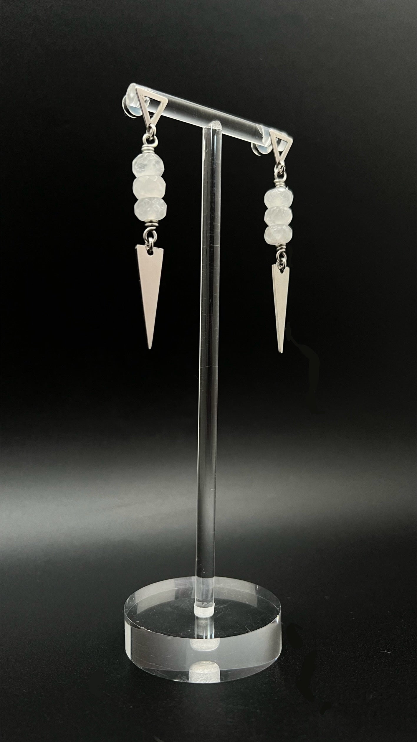 Stainless steel spear-drop earrings with triangle studs and three faceted clear quartz beads, 6.5 cm length, inspired by Orion’s celestial geometry — Lawless Jewellery.