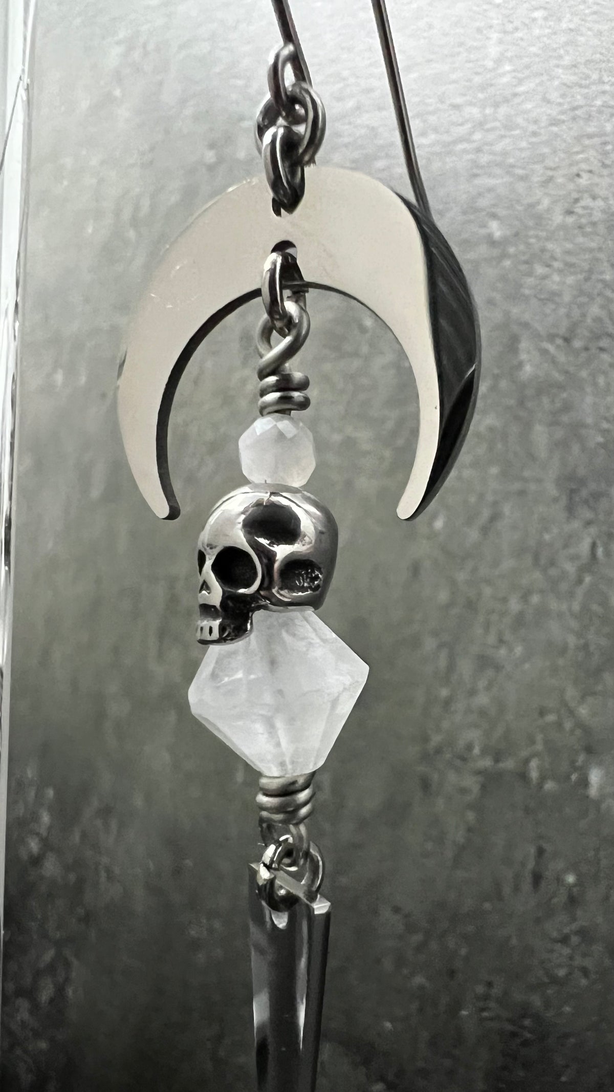Silver stainless steel earrings featuring Moonstone, Quartz Crystal, and small skull details — limited edition design from The Shadow Edit — Lawless Jewellery.