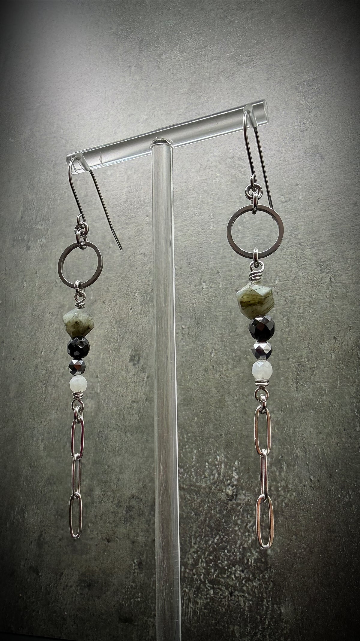 Mixed gemstone drop earrings featuring Labradorite, Black Spinel, Moonstone, and Terahertz set in stainless steel, in black, grey, white, and silver tones — Lawless Jewellery.