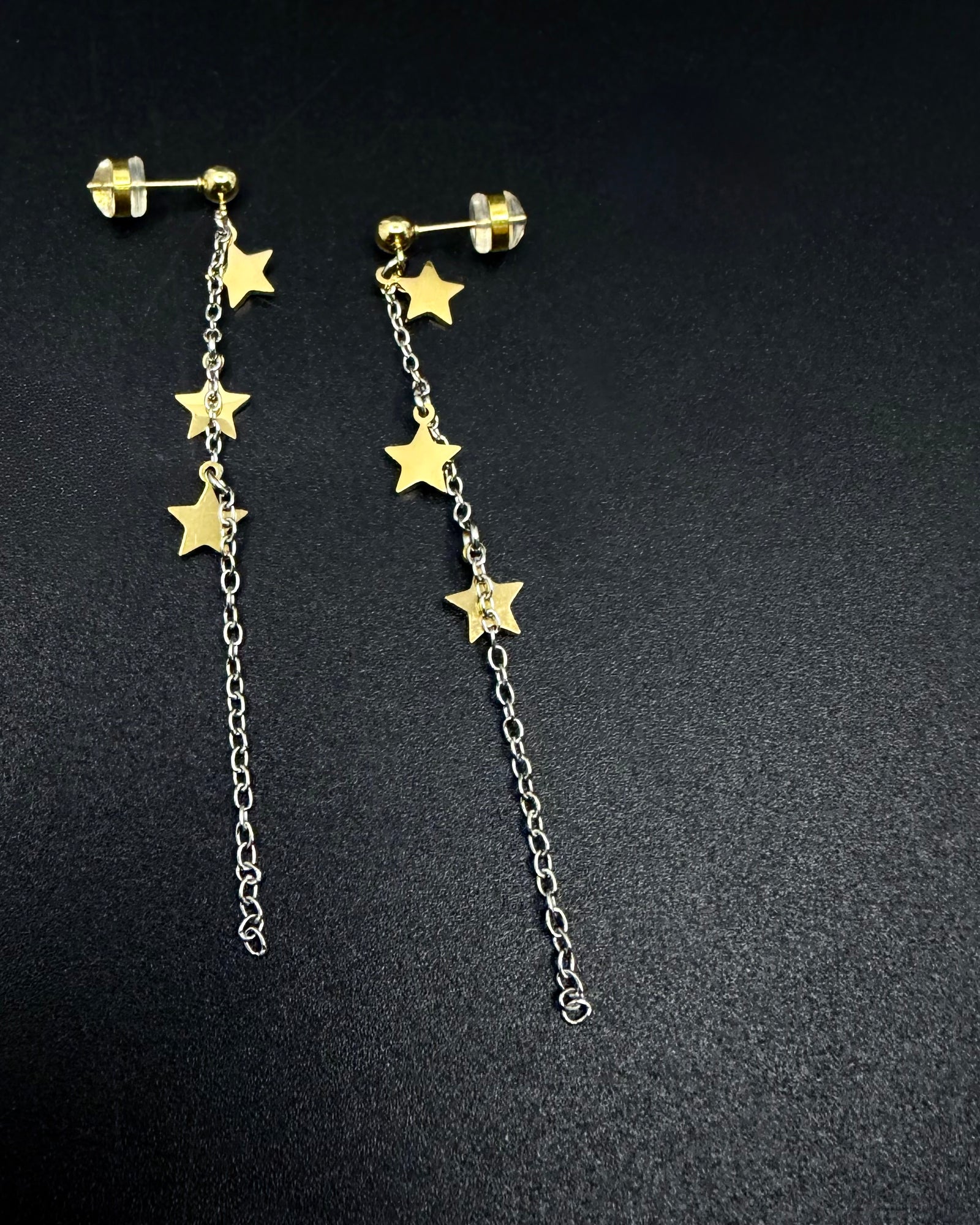 Short silver and gold star drop earrings with fine stainless steel chain, Urania Meridian Earrings 7 cm by Lawless Jewellery.