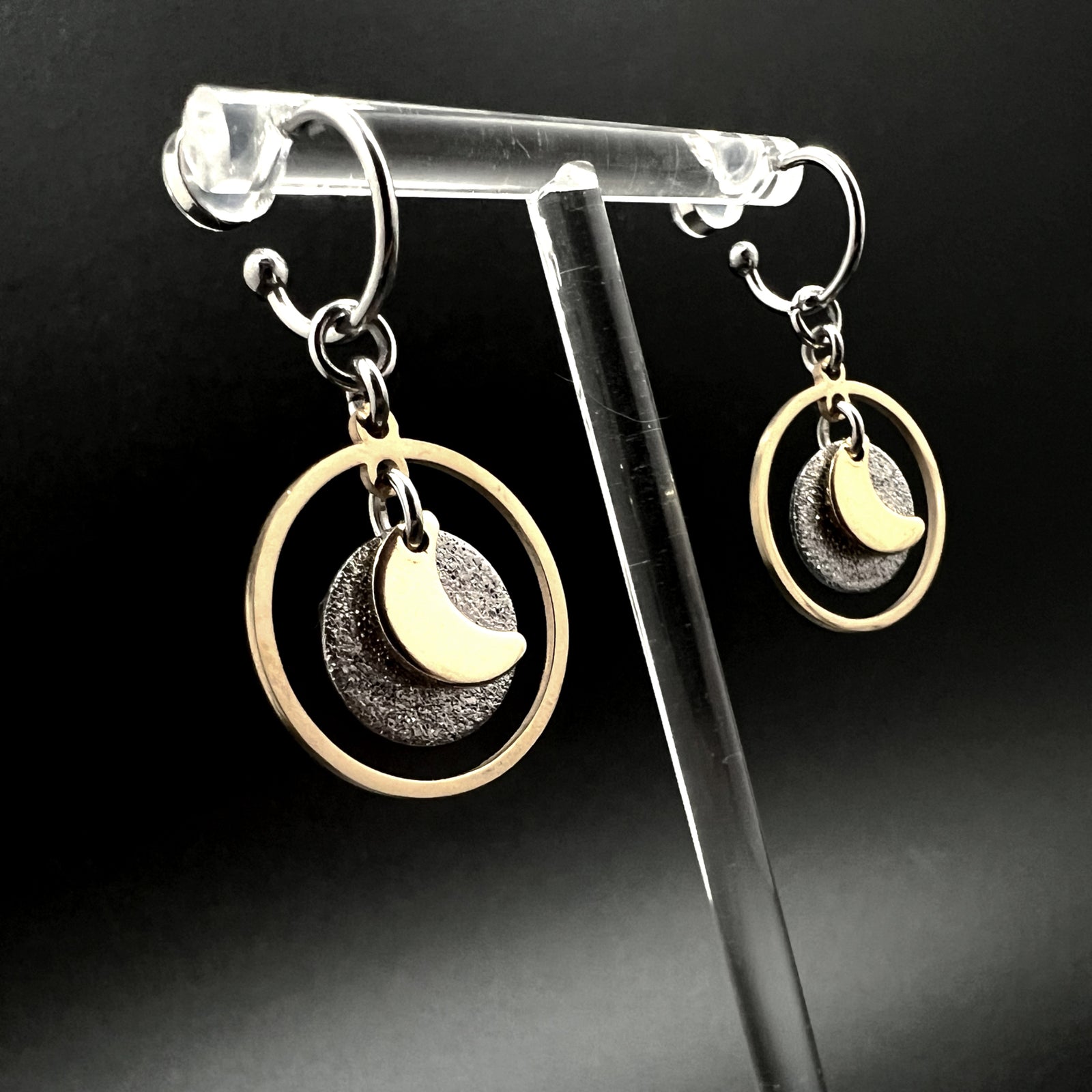 Mixed-metal stainless steel hoop earrings with detachable gold and silver moon and star charms and a textured disc in a 20 mm ring — Lawless Jewellery