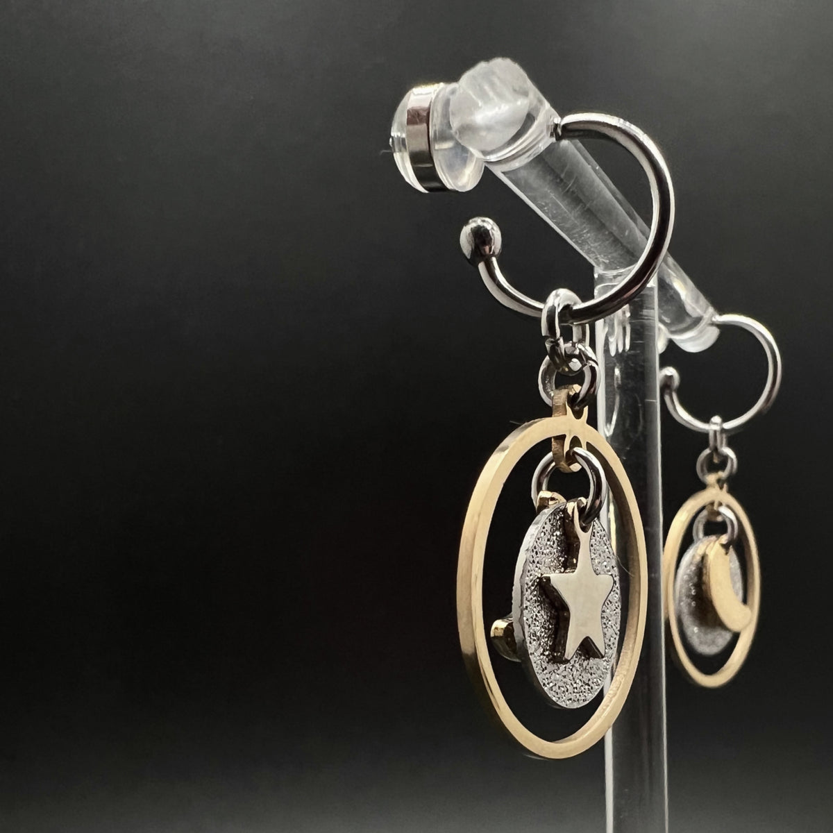 Mixed-metal stainless steel hoop earrings with detachable gold and silver moon and star charms and a textured disc in a 20 mm ring — Lawless Jewellery