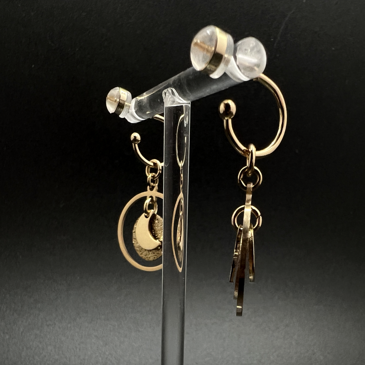 Gold stainless steel hoop earrings with detachable moon and star charms and a textured disc inside a 20 mm ring, 4 cm drop — Lawless Jewellery.