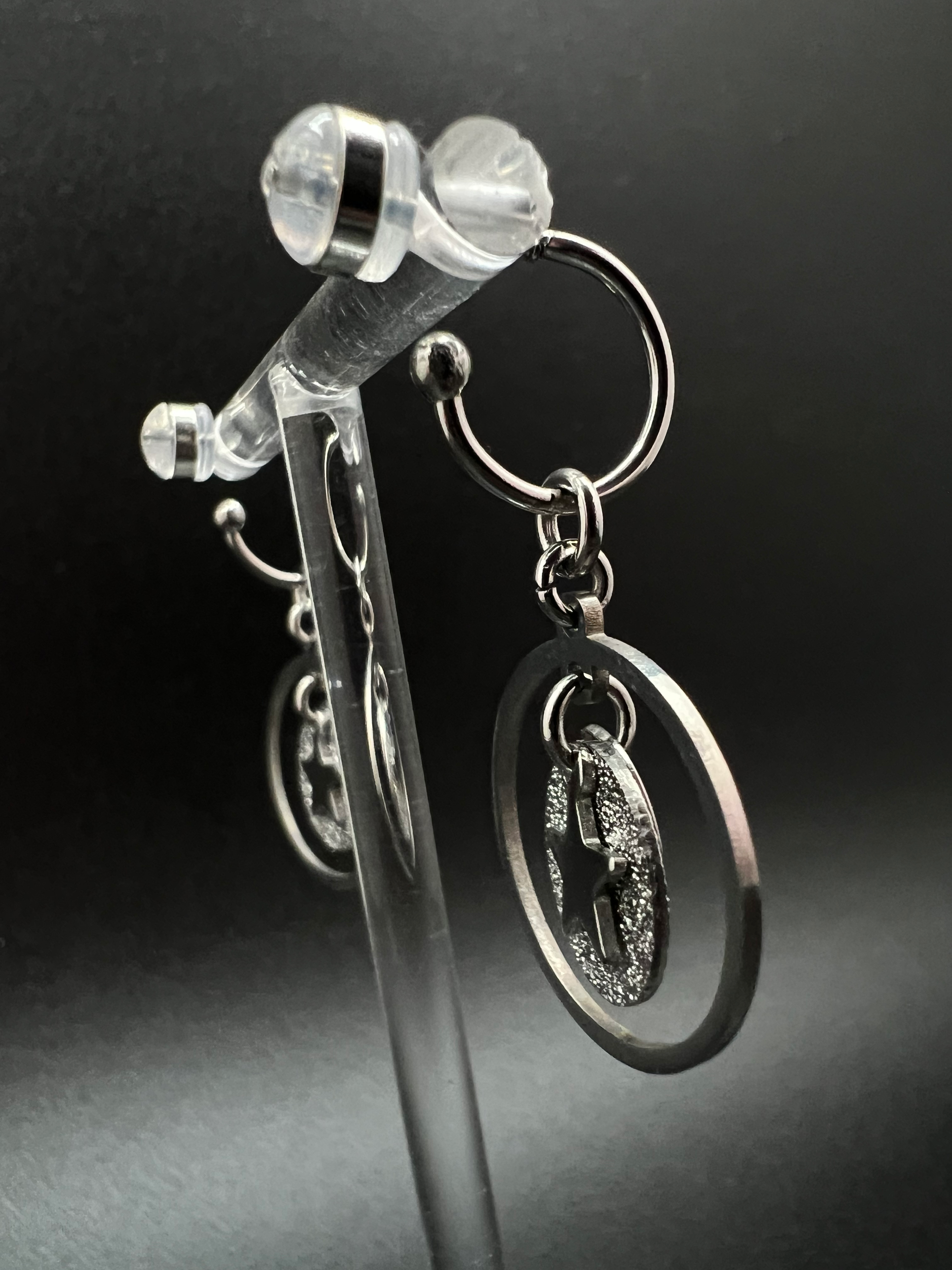 Silver stainless steel hoop earrings with detachable moon and star charms and a textured disc inside a 20 mm ring, 4 cm drop — Lawless Jewellery