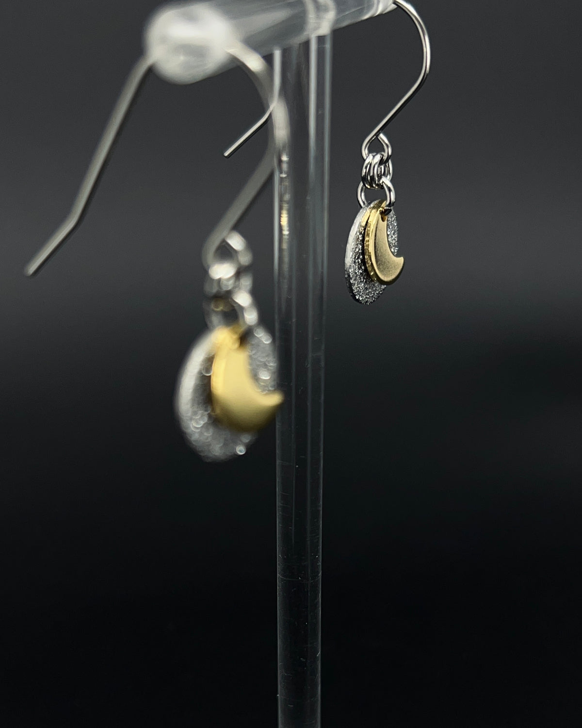 Urania Signal Moon earrings in silver and gold with textured disc and crescent moon detail, celestial drop earrings by Lawless Jewellery