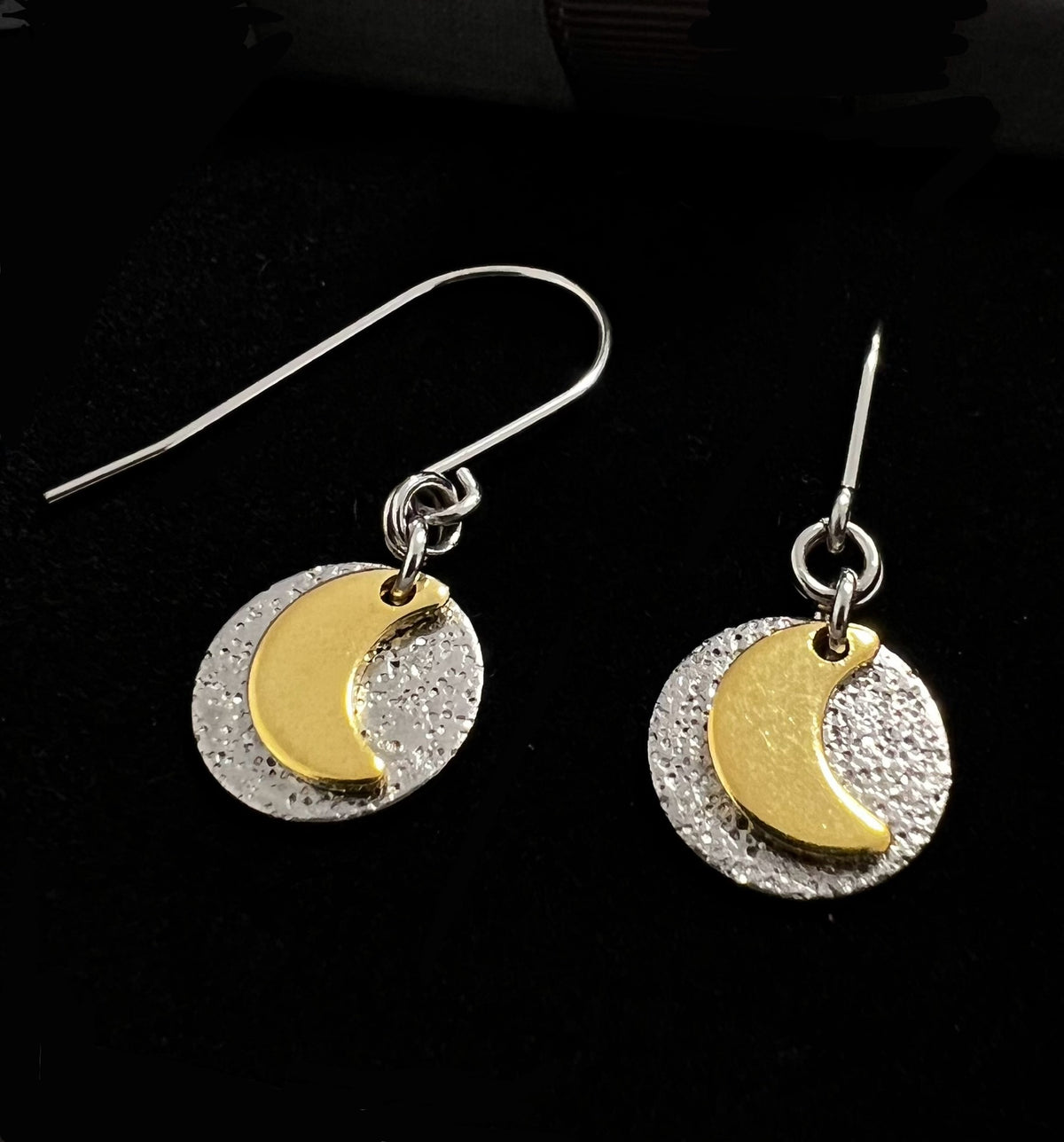 Urania Signal Moon earrings in silver and gold with textured disc and crescent moon detail, celestial drop earrings by Lawless Jewellery