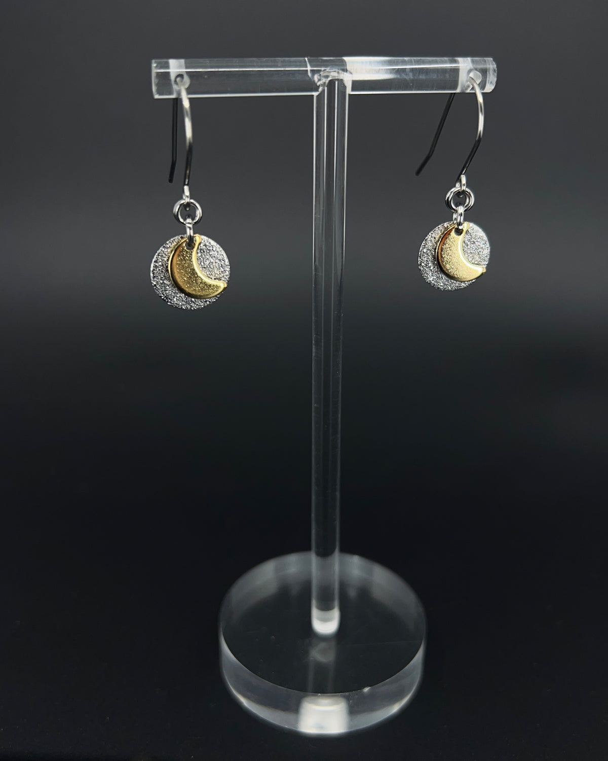 Urania Signal Moon earrings in silver and gold with textured disc and crescent moon detail, celestial drop earrings by Lawless Jewellery