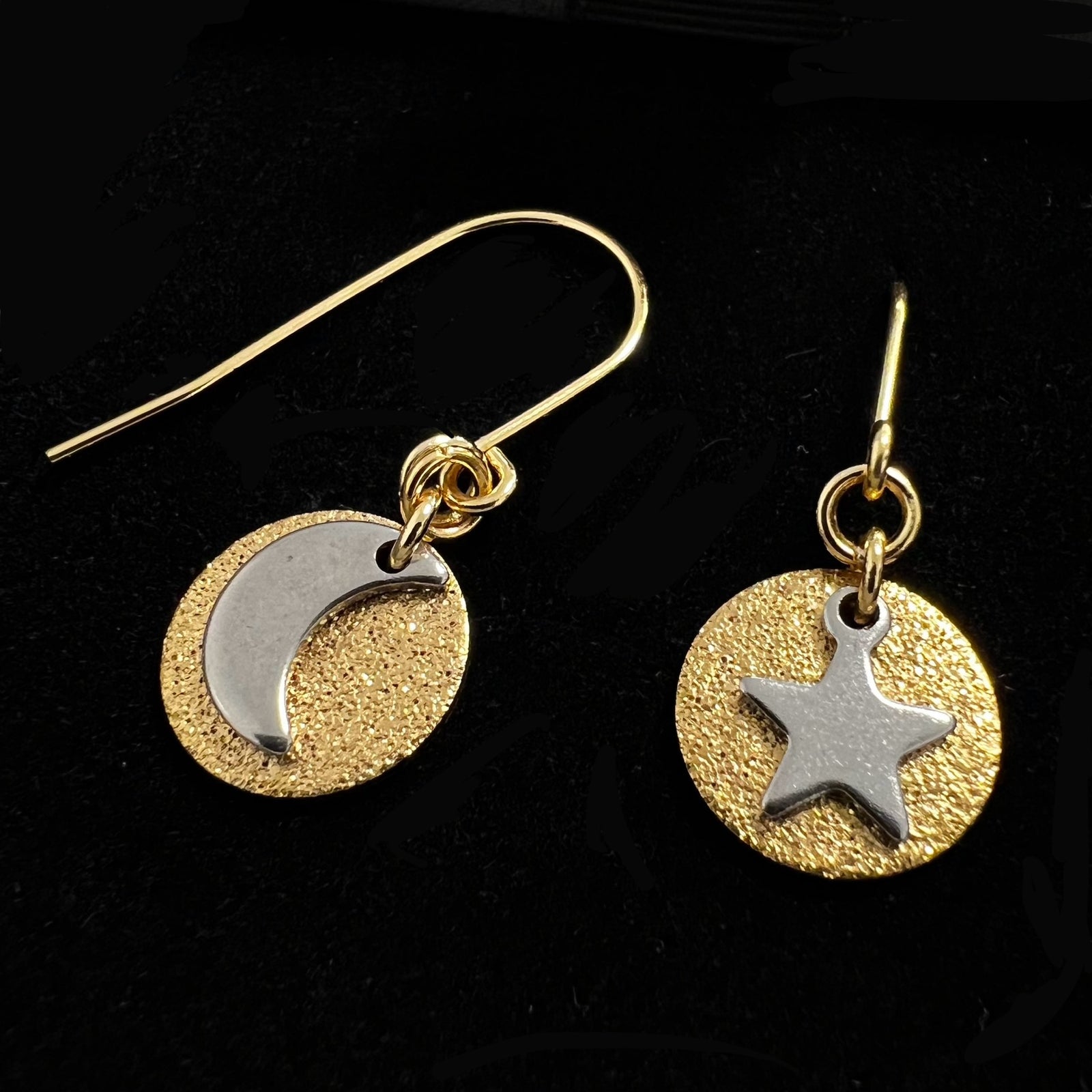 Gold and silver moon and star earrings with textured gold discs, minimalist celestial drop earrings by Lawless Jewellery