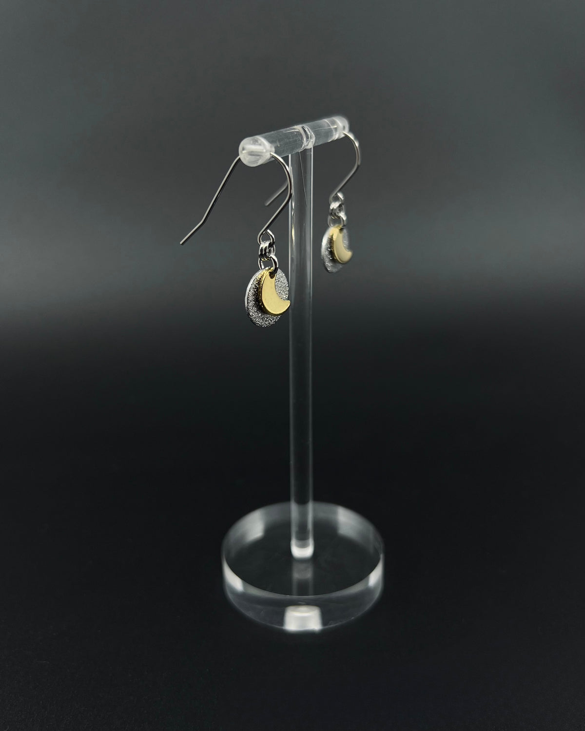 Urania Signal Moon earrings in silver and gold with textured disc and crescent moon detail, celestial drop earrings by Lawless Jewellery
