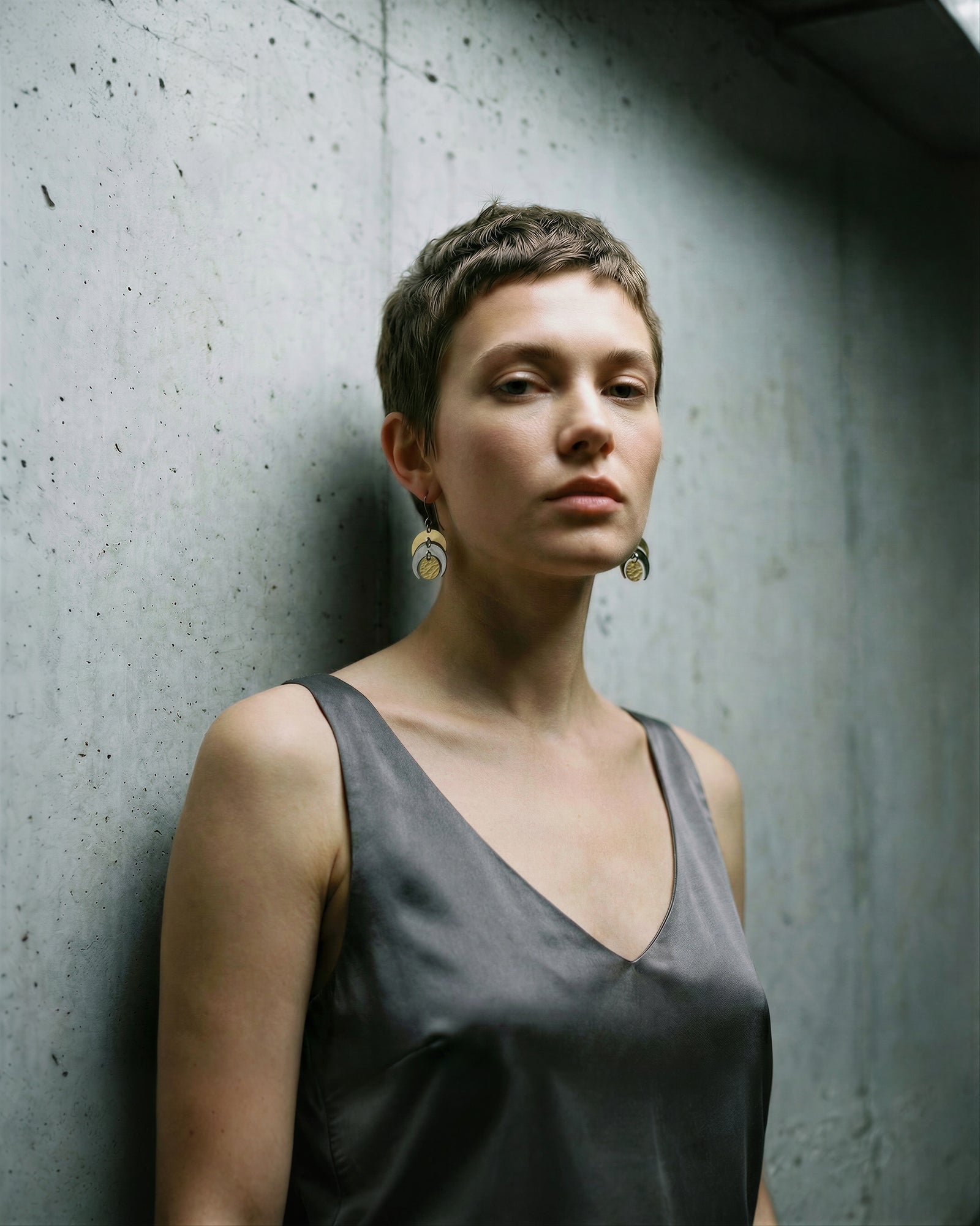 Silver Luna Phase Earrings with polished stainless-steel crescents and textured central disc, 20 mm wide and 4 cm long — Lawless Jewellery